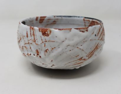 null DUTERTRE Pierre (1956)

Stoneware bowl with white glaze, signed, dated 95 and...