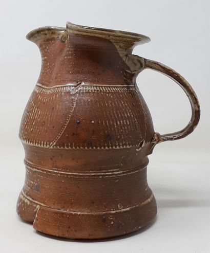 null GALISSAIRES François

Brown stoneware pitcher with pinched spout and incised...