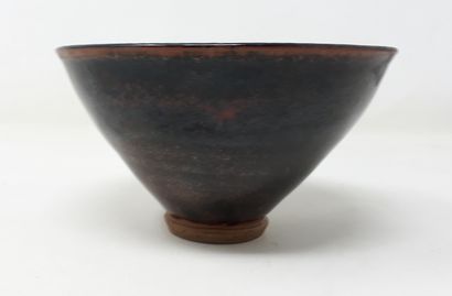  PERFETTI Michel 
Stoneware bowl with eggplant and black glaze, stamped in hollow...