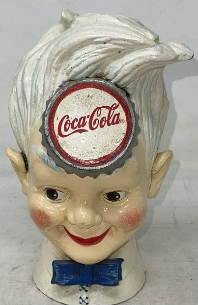 null Piggy bank "Groom" in cast iron painted "Coca Cola

Around 1950

H.: 19 cm