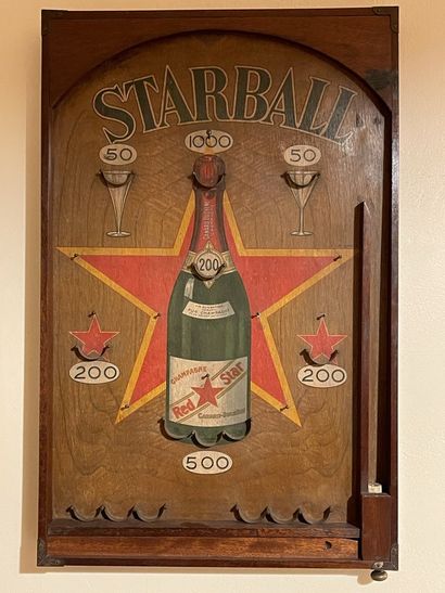 null Wooden pinball table advertising "Champagne Red Star de Canard-Duchêne".

61...