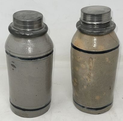 null 
Set of three stoneware tobacco bottles, two of which are pewter-mounted




H.:...