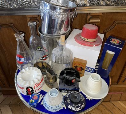 Lot of dishes, glassware and advertising...
