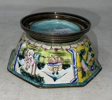 null Painted enamel bowl with characters in a landscape

China, 19th century

H....