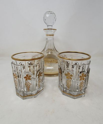 null Lot of glassware with gold decoration including:

- two cut glass glasses with...