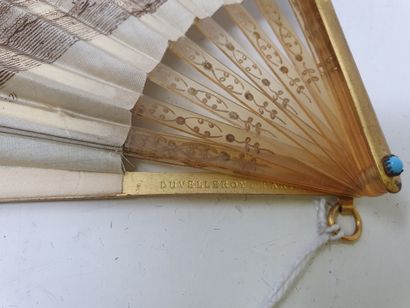 null Fan with a printed paper leaf enhanced with gouache, gilded horn and metal frame...