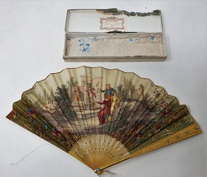 null Fan with a printed paper leaf enhanced with gouache, gilded horn and metal frame...
