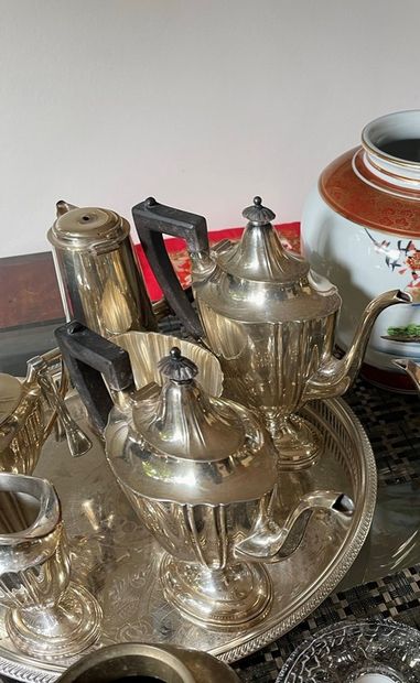 null Tea and coffee set in metal with pinched sides, including teapot, coffee pot,...