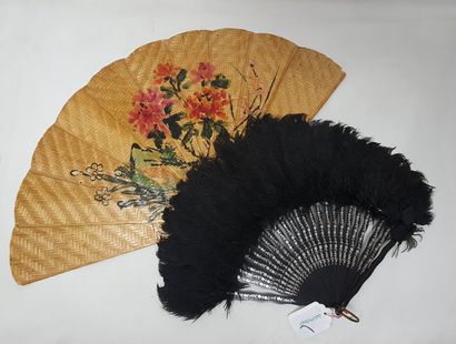 null Lot of two fans, the 1st in ostrich feathers. The 2nd in spartan, painted with...
