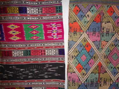 null Two skirts, Laos, ikat fabric and embroidered with geometric and elephant motifs.

	0,...