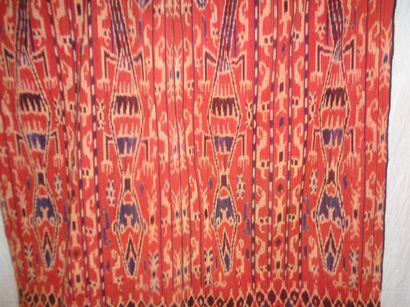 null Sarong Ikat, Tsumba, red background, lizards with human heads.

	2, 37 x 1,...