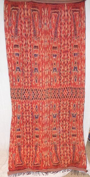 null Sarong Ikat, Tsumba, red background, lizards with human heads.

	2, 37 x 1,...