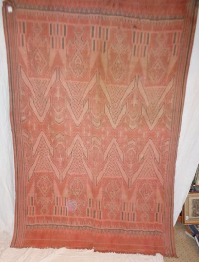 null Ikat tapestry, Borneo, brick red background, characters in chevrons

	1, 45...