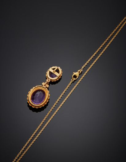 null Yellow gold (750‰) PENDANT and its CHAIN set with two oval amethysts each surrounded...