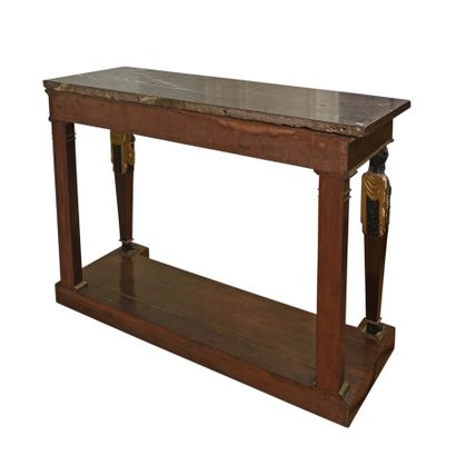 null Mahogany and mahogany veneer console opening to a drawer in the belt, black...