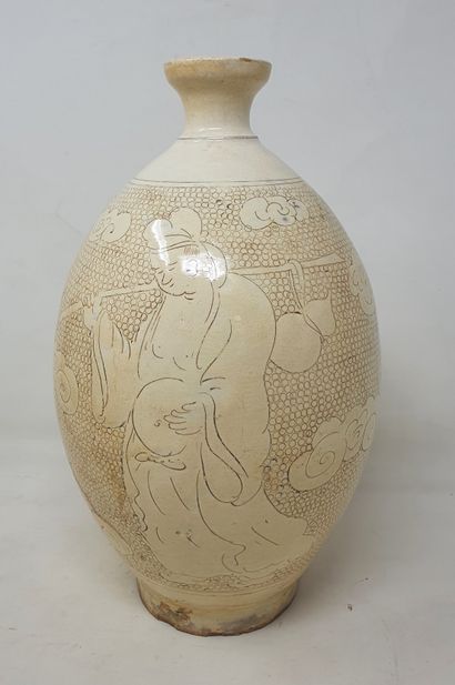 null Cream stoneware ovoid vase with engraved decoration of immortal carrying a double...