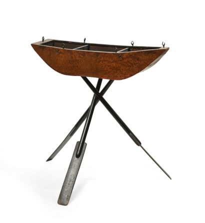 null Planter in burl veneer representing a boat resting on a tripod in blackened...