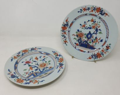 null Pair of porcelain plates decorated with a flowering barrier and pomegranate...