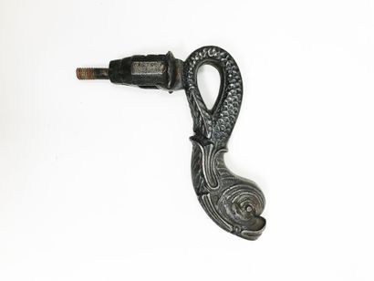 null Iron door knocker with a dolphin on a leafy rose window. 
18, 6 cm. 
Dolphin...