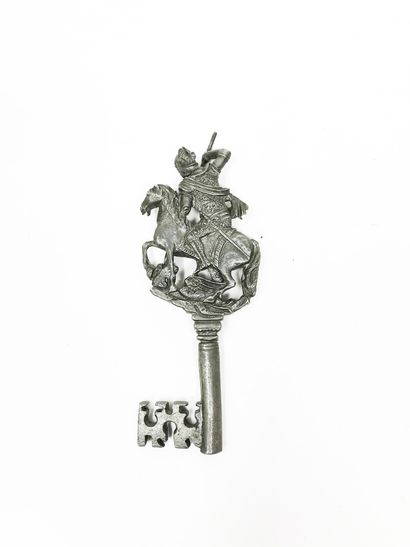 null Cast metal key with decoration of Saint Michael, slaying the dragon. 14, 83...