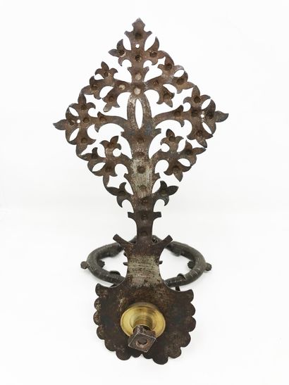 null Doorknocker in wrought iron and carved in head of stag, holding the ring formed...