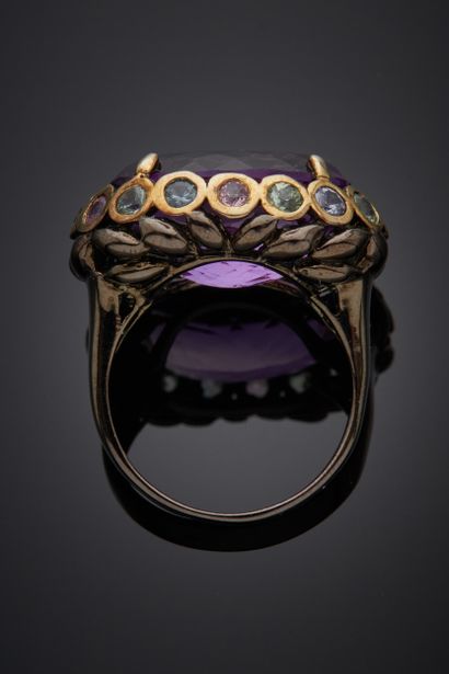 null Important blackened silver and vermeil (925‰) openwork ring set with an oval...