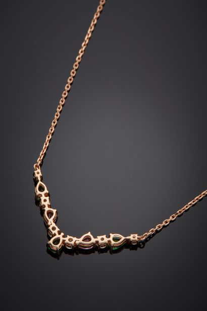 null NECKLACE composed of a pink gold (750‰) chain set with an alignment of brilliant-cut...