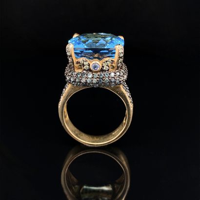 null Important silver and vermeil ring (925‰) set with a cushion-shaped treated blue...