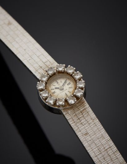 null OMEGA
BRACELET MONTRE ronde de dame en or gris (750‰). Lunette sertie de diamants...