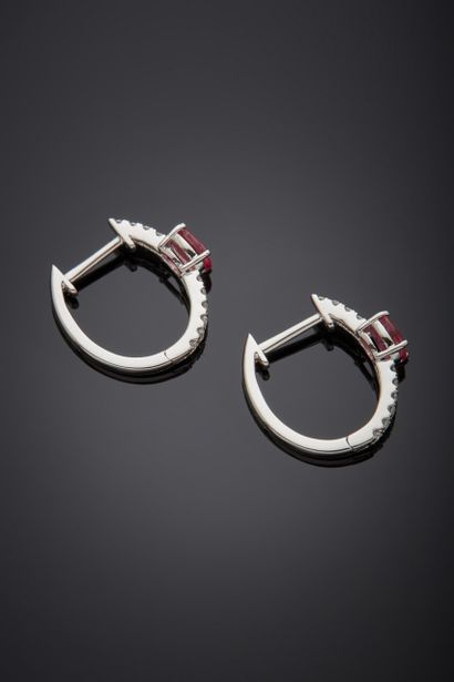 null Fine pair of white gold (750‰) "creole" EARRINGS set with an alignment of brilliant-cut...