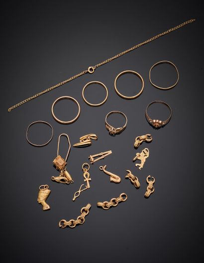 null Lot of miscellaneous yellow gold (750‰) PENDANTS, ALLIANCES, FERMOIRS and DEBRIS....
