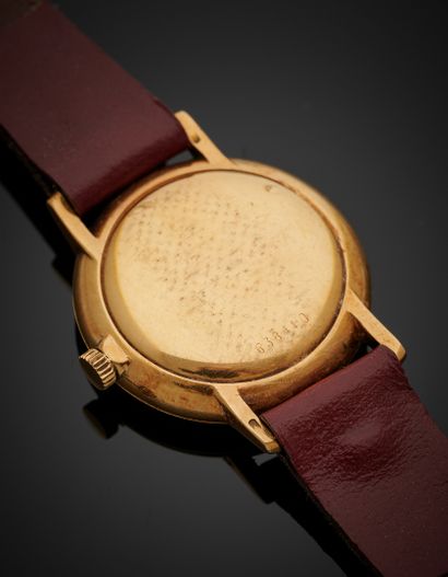 null JUVENIA 
BRACELET WATCH round lady in yellow gold (750‰). Finely guilloched...