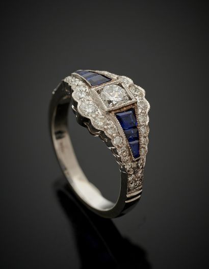 null White gold (750‰) ring set with brilliant-cut diamonds, including a larger one...