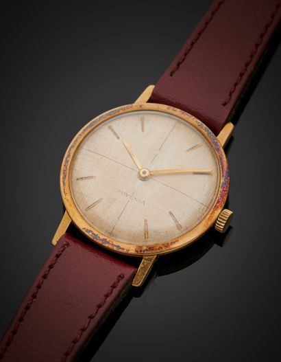 null JUVENIA 
BRACELET WATCH round lady in yellow gold (750‰). Finely guilloched...