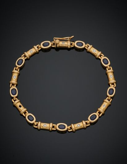 null Fine yellow gold (750‰) articulated BRACELET set with small diamonds and alternating...