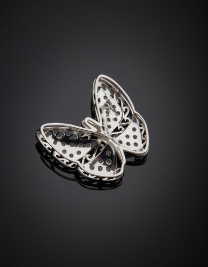 null White gold (750‰) openwork "butterfly" pendant set with brilliant-cut diamonds....