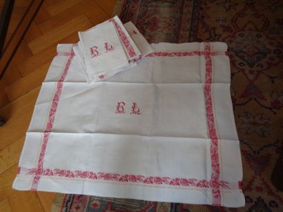 Suite of twelve towels in white and red damask,...