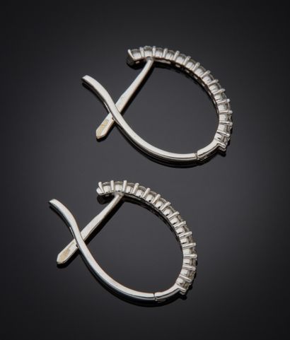 null Pair of "creole" EARRINGS in white gold (750‰) set with brilliant-cut diamonds.
Length...