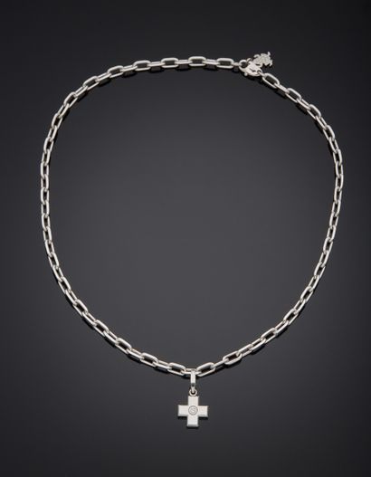 null CARTIER 
White gold (750‰) "cross" pendant and oval-link CHAIN, centered with...