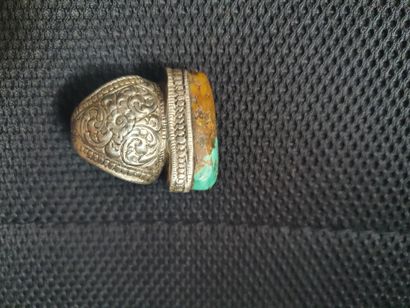 null Large hammered metal ring with foliage and scrolls and a large turquoise stone,...