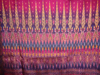 null Three ikat sarongs, Cambodia and Thailand, polychrome brocaded purple background...