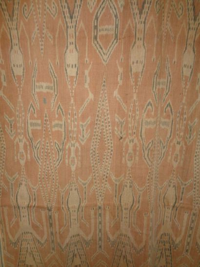 null Ikat tapestry, Borneo, red background, cream and black lizard design (snags).
...