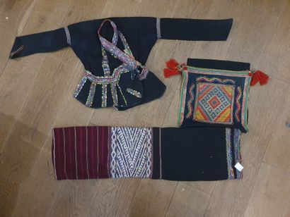 null Jacket, skirt and headdress, Laos, polychrome embroidered indigo canvas.