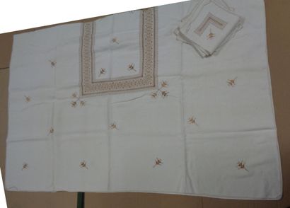 null Tablecloth and eight napkins in unbleached linen embroidered in saffron yellow...