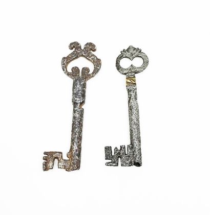 null Two keys with drilled shank, one with brass insert on the boss
France, 16th...