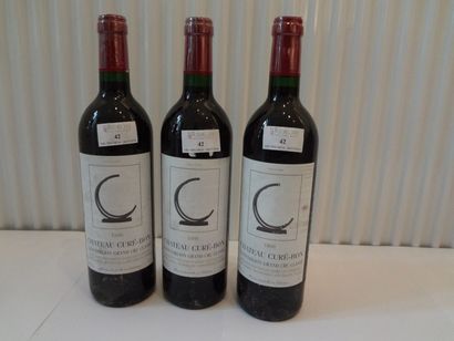 null 3 bouteilles de Château Curé-Bon, 1998, étiquettes légèrement tâchées, St E...
