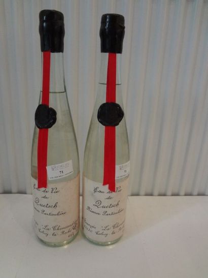 null 2 bouteilles d'eau-de-vie de Quetsch, Marcel Fraçois, étiquettes très légèrement...
