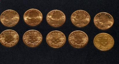 null Dix pièces en or de vingt francs Suisse, frottées, usées. Poids brut total :...