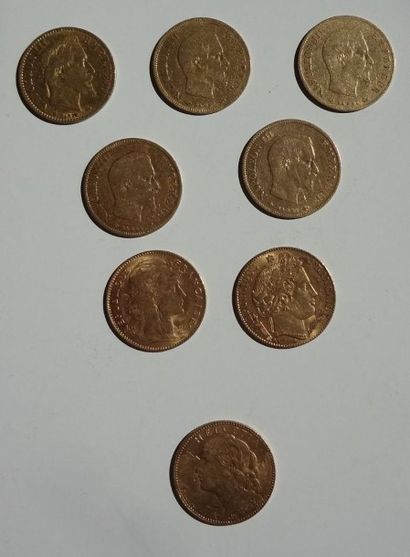 null Sept pièces de 10 FF or, une pièce de 10 F suisse or, Poids total: 25,58 g (frottées...
