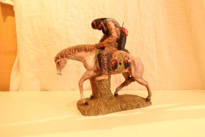 null "Indien à cheval" Résine patinée polychrome, vers 1980

27 x 29 cm
